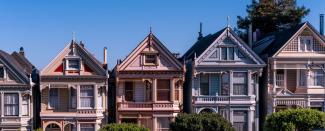 Different colored houses on a hill